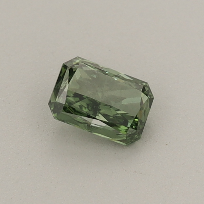 Actual 0.32 carat Fancy Vivid Green Radiant lab-grown diamond