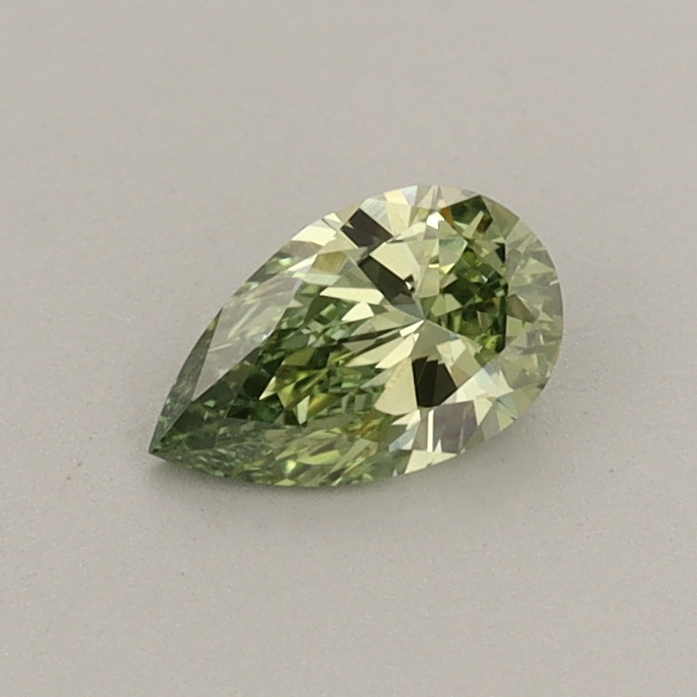 Actual 0.33 carat Fancy Vivid Green Pear lab-grown diamond