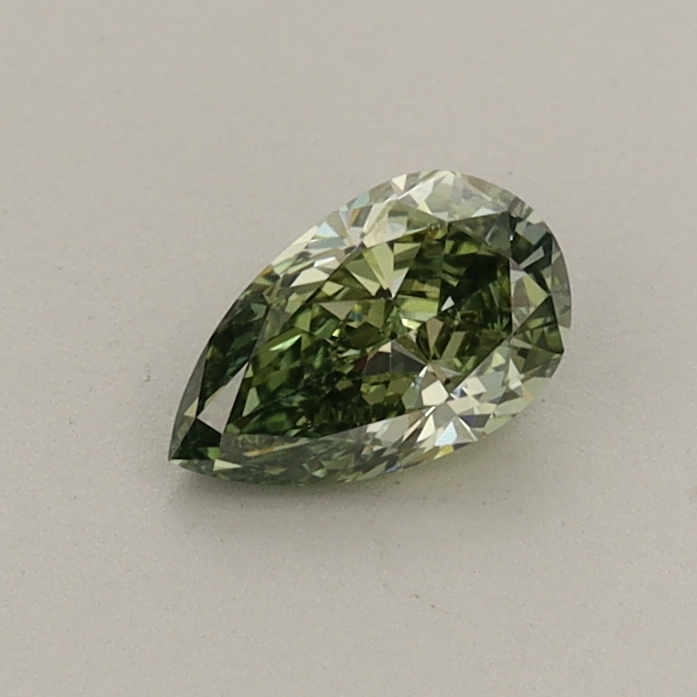 Actual 0.41 carat Fancy Vivid Green Pear lab-grown diamond