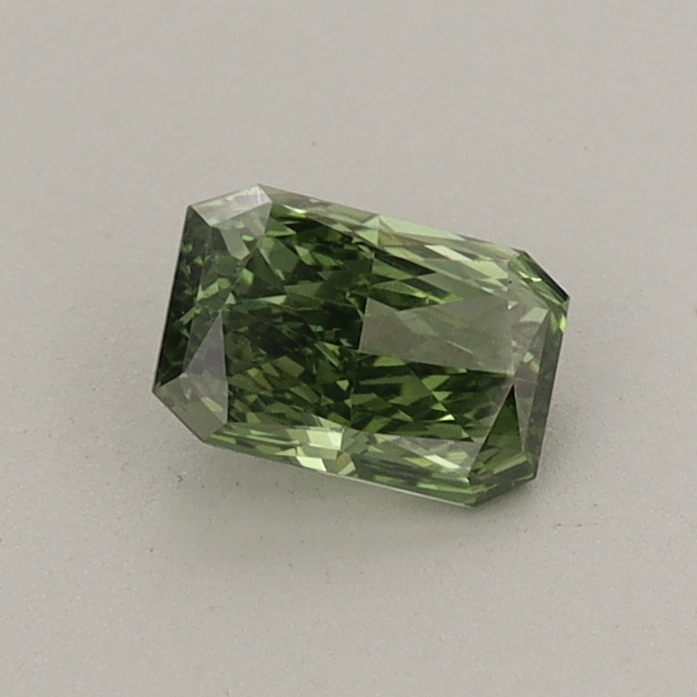 Actual 0.43 carat Fancy Vivid Green Radiant lab-grown diamond