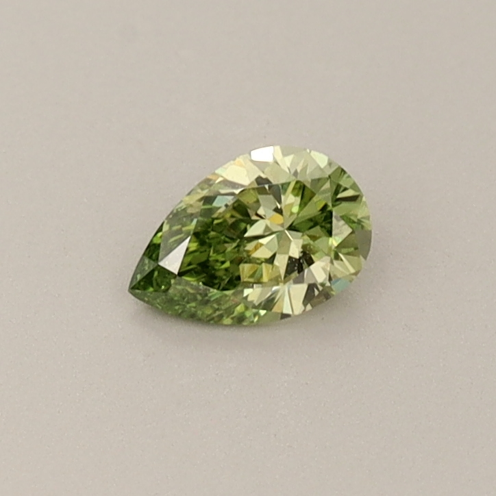 Actual 0.24 carat Vivid Green Pear lab-grown diamond