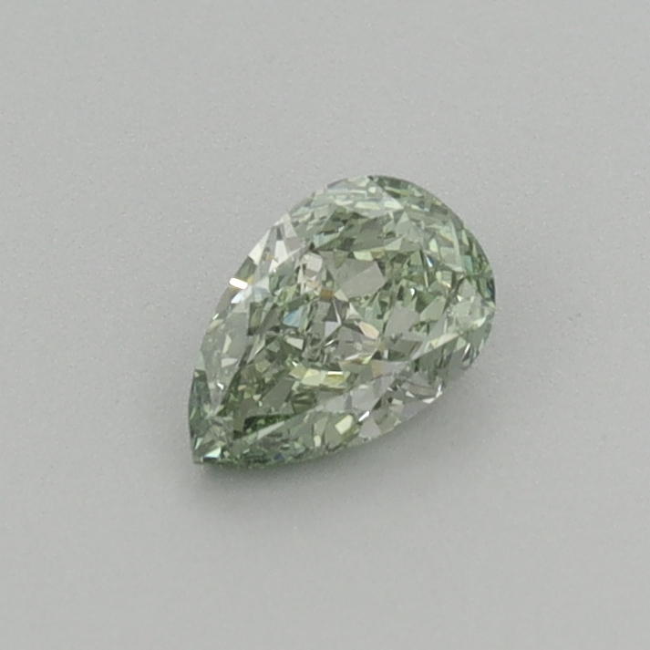 Actual 0.32 carat Fancy Vivid Green Pear lab-grown diamond