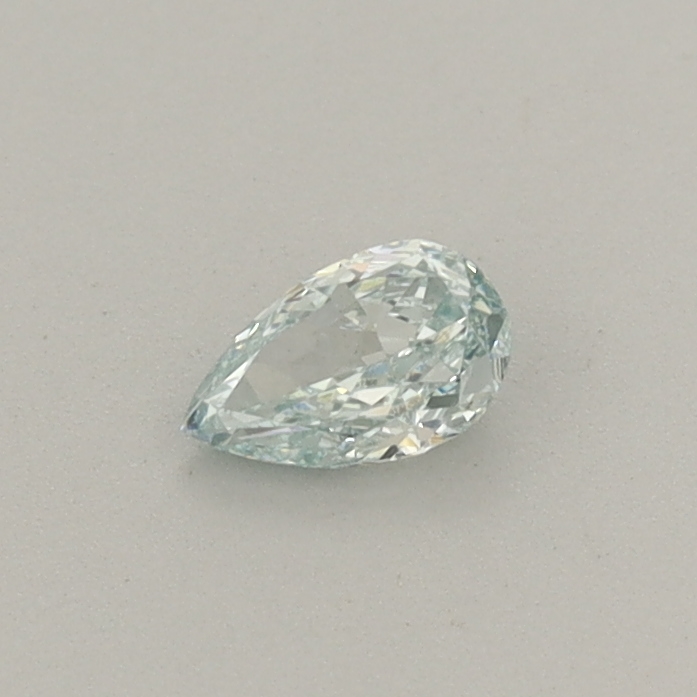 Actual 0.22 carat Fancy Intense Green Pear lab-grown diamond