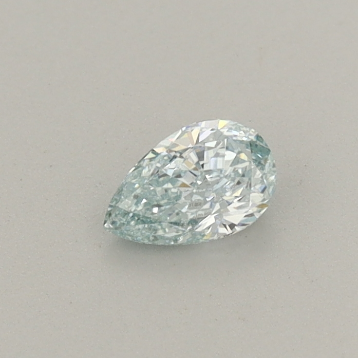 Actual 0.26 carat Fancy Intense Green Pear lab-grown diamond