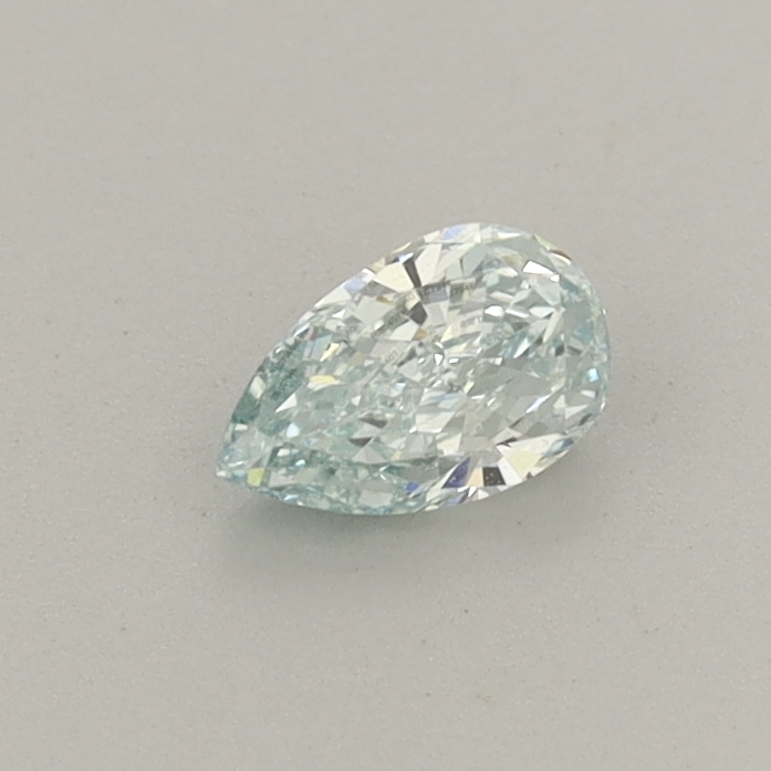 Actual 0.33 carat Fancy Intense Green Pear lab-grown diamond