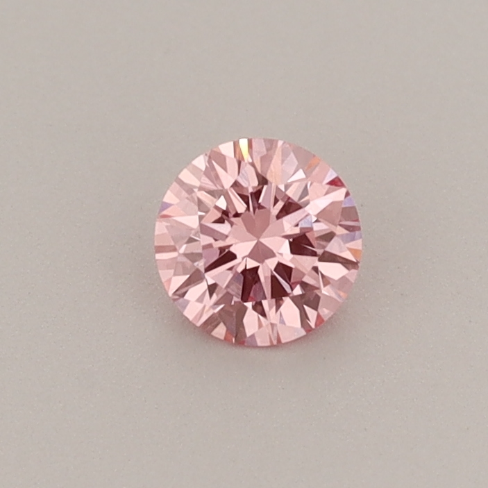 Actual 0.24 carat Vivid Pink Round lab-grown diamond