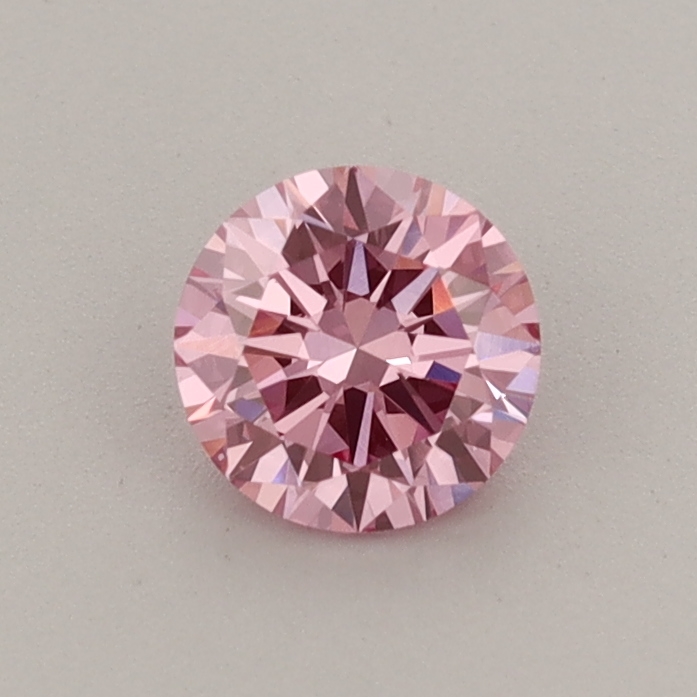 Actual 0.5 carat Vivid Pink Round lab-grown diamond