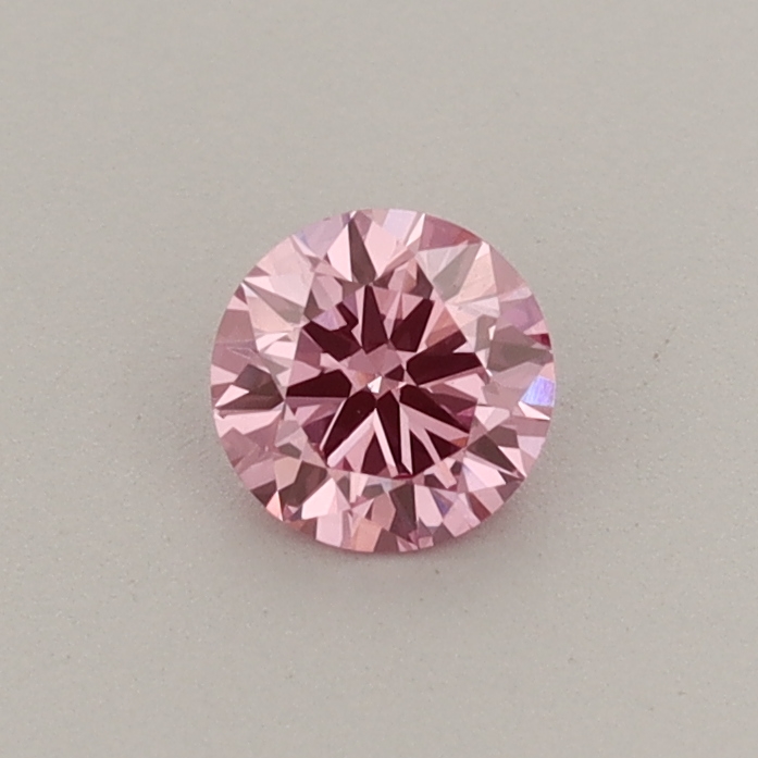 Actual 0.31 carat Fancy Vivid Pink Round lab-grown diamond