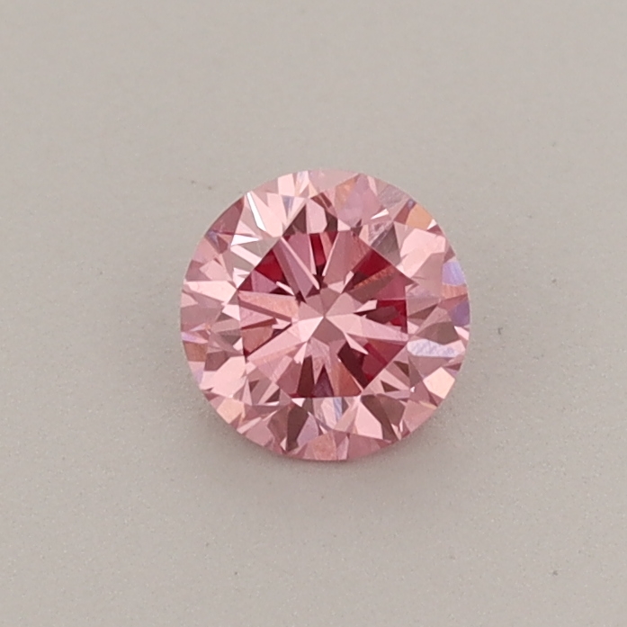 Actual 0.36 carat Fancy Vivid Pink Round lab-grown diamond
