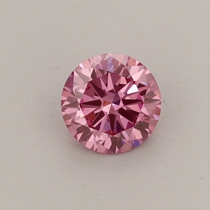 Actual 0.37 carat Fancy Vivid Pink Round lab-grown diamond