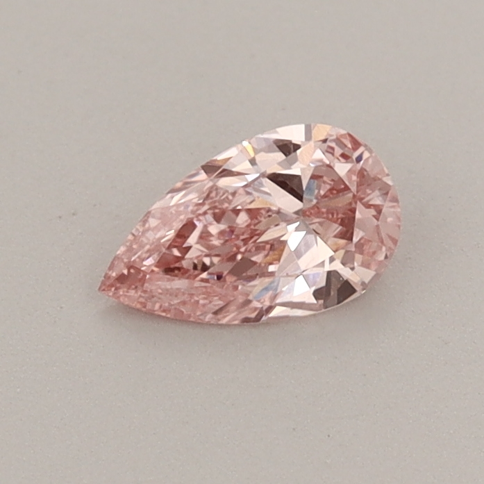 Actual 0.3 carat Fancy Vivid Pink Pear lab-grown diamond