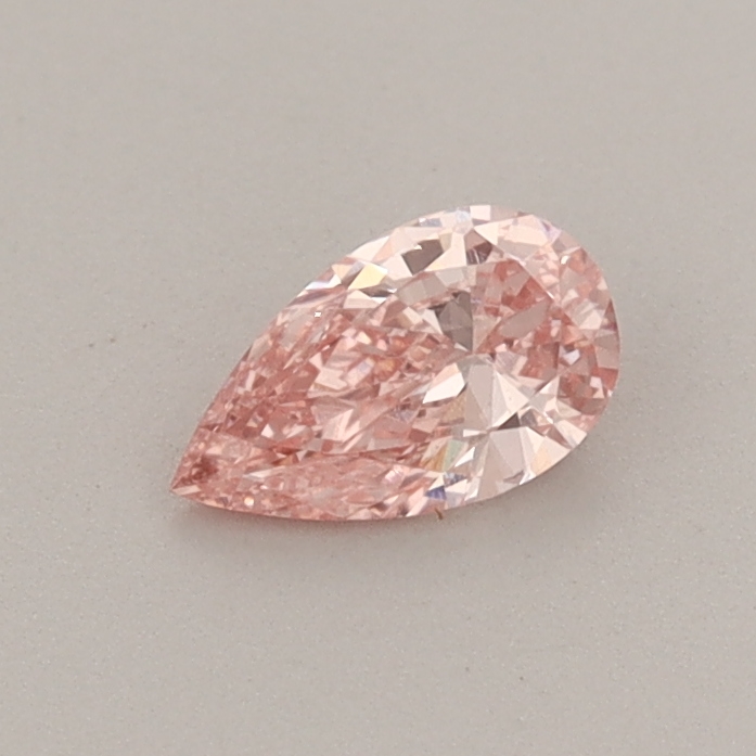 Actual 0.3 carat Fancy Vivid Pink Pear lab-grown diamond