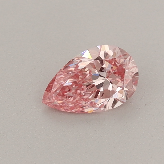 Actual 0.34 carat Fancy Vivid Pink Pear lab-grown diamond