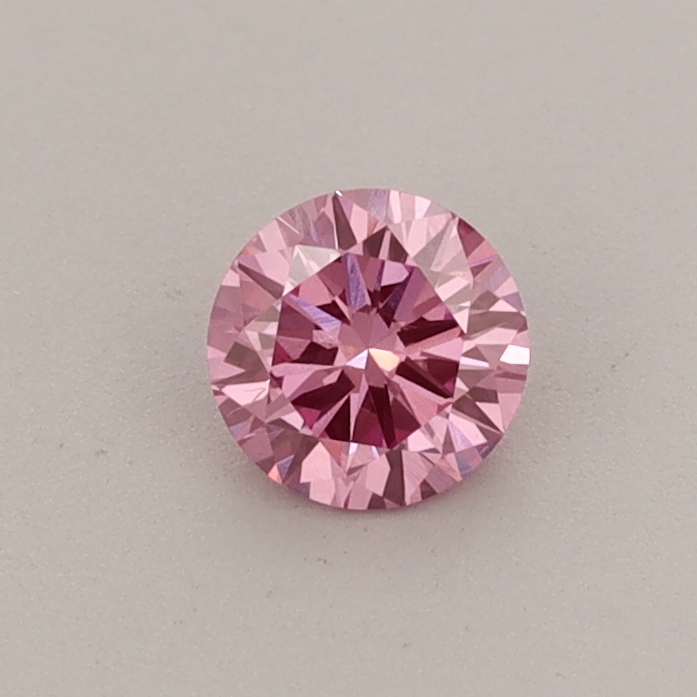 Actual 0.33 carat Fancy Vivid Pink Round lab-grown diamond