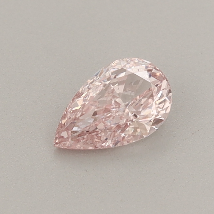 Actual 0.31 carat Fancy Intense Pink Pear lab-grown diamond