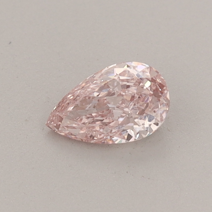 Actual 0.33 carat Fancy Intense Pink Pear lab-grown diamond