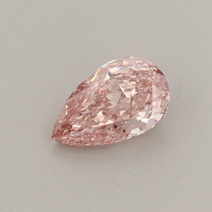Actual 0.34 carat Fancy Vivid Pink Pear lab-grown diamond
