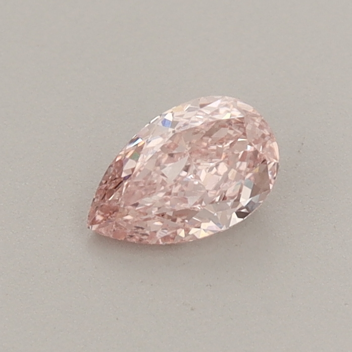 Actual 0.34 carat Fancy Intense Pink Pear lab-grown diamond
