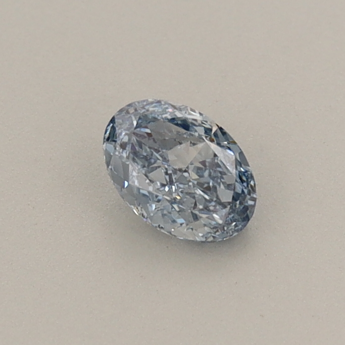 Actual 0.29 carat Fancy Vivid Blue Oval lab-grown diamond