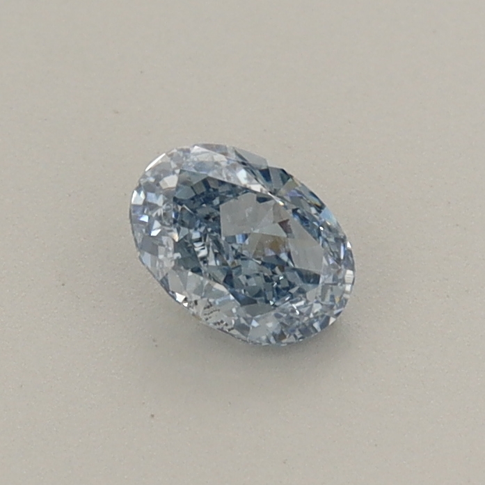 Actual 0.35 carat Fancy Vivid Blue Oval lab-grown diamond