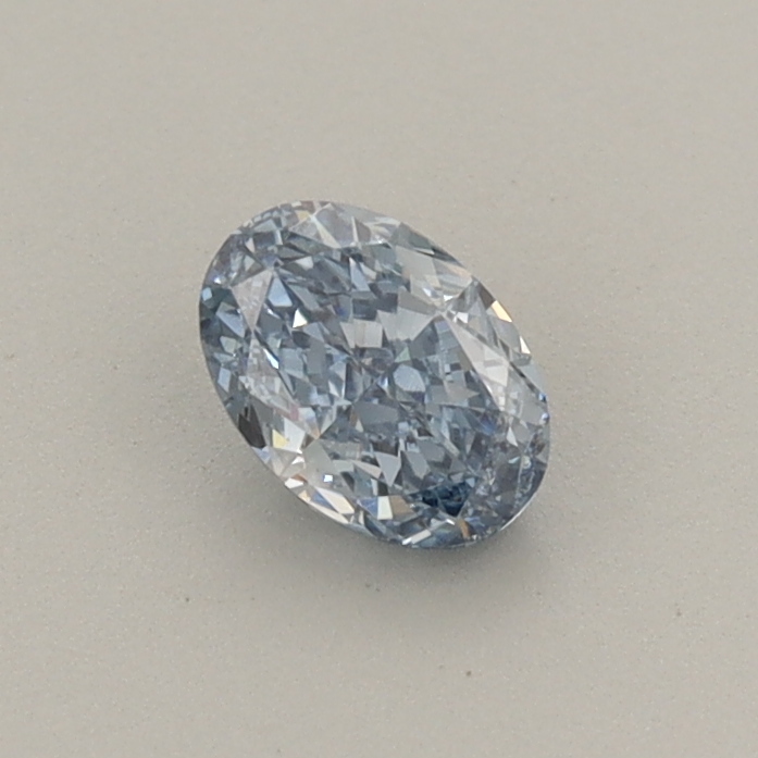 Actual 0.39 carat Fancy Vivid Blue Oval lab-grown diamond