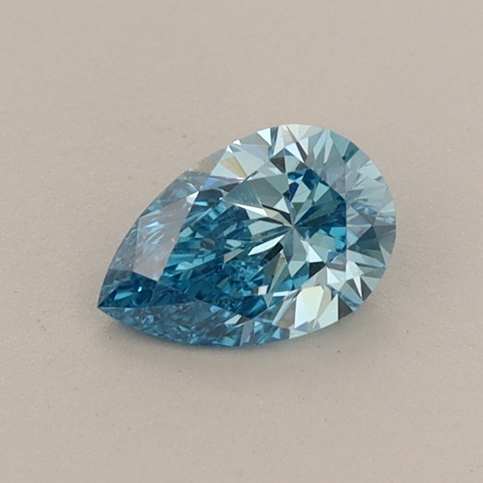 Actual 0.42 carat Fancy Vivid Blue Pear lab-grown diamond