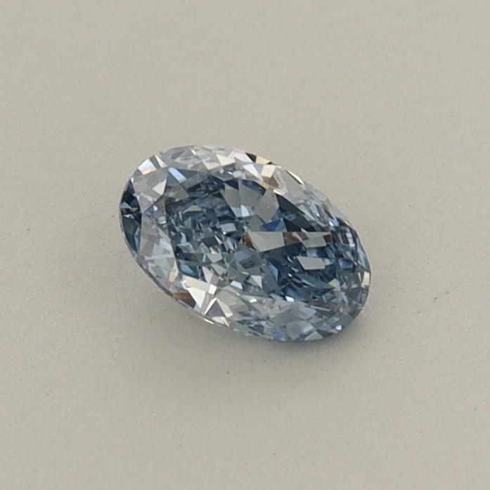 Actual 0.32 carat Fancy Vivid Blue Oval lab-grown diamond