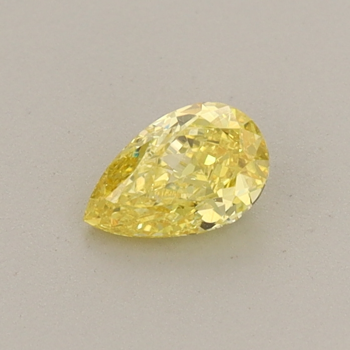 Actual 0.32 carat Fancy Vivid Yellow Pear lab-grown diamond