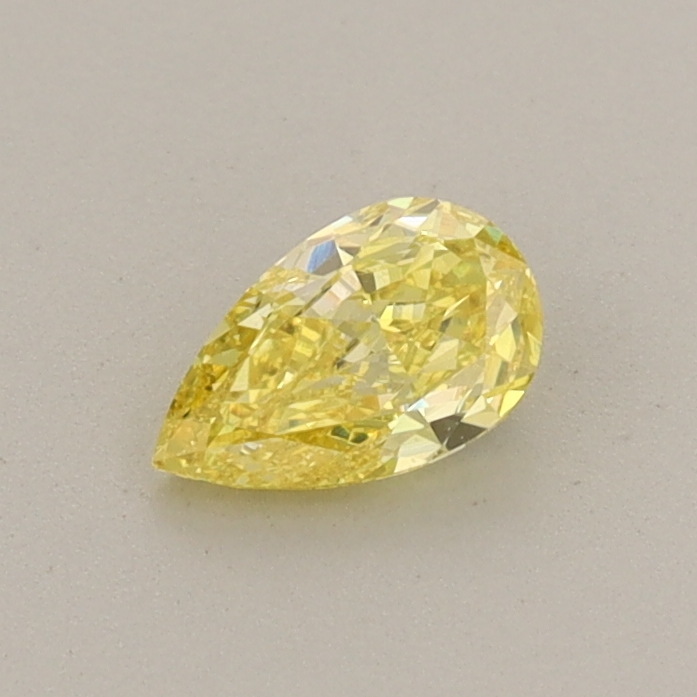Actual 0.35 carat Fancy Vivid Yellow Pear lab-grown diamond