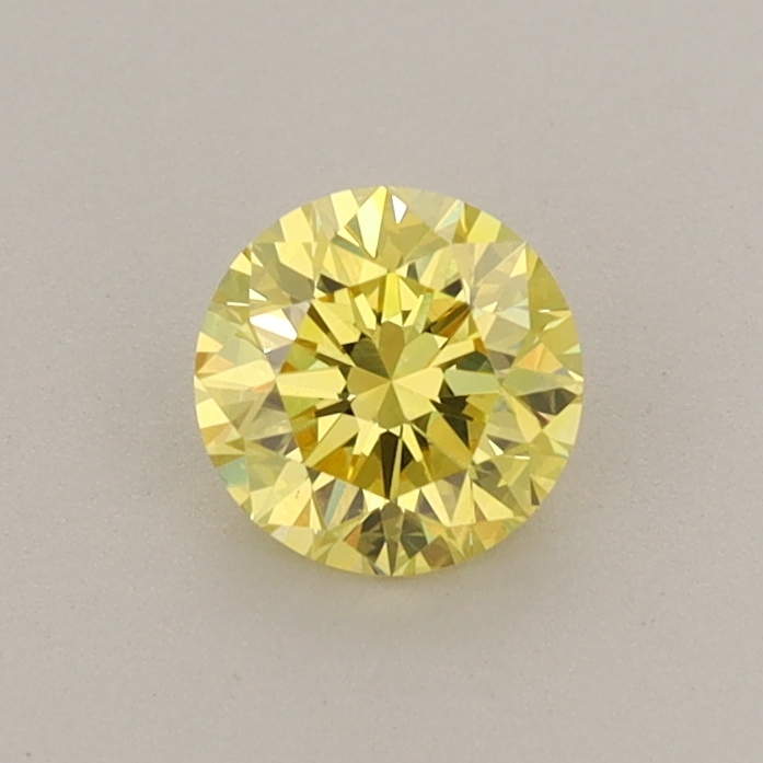 Actual 0.53 carat Vivid Yellow Round lab-grown diamond