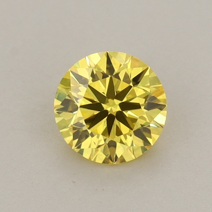 Actual 0.54 carat Vivid Yellow Round lab-grown diamond
