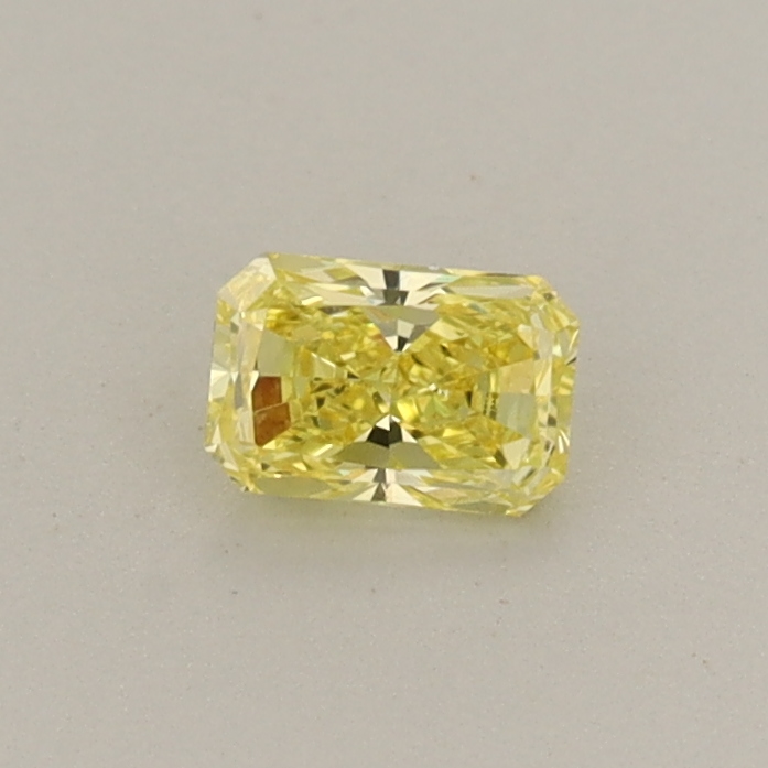 Actual 0.23 carat Vivid Yellow Radiant lab-grown diamond