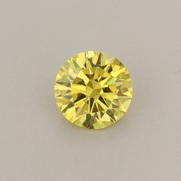 Actual 0.28 carat Vivid Yellow Round lab-grown diamond