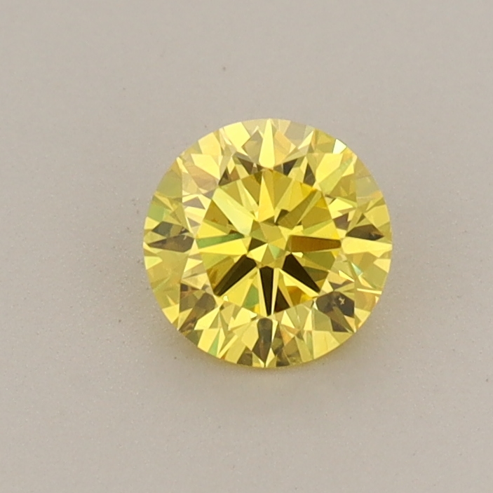 Actual 0.43 carat Vivid Yellow Round lab-grown diamond