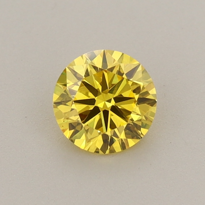 Actual 0.53 carat Vivid Yellow Round lab-grown diamond