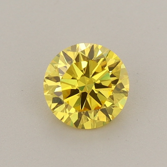 Actual 0.55 carat Vivid Yellow Round lab-grown diamond