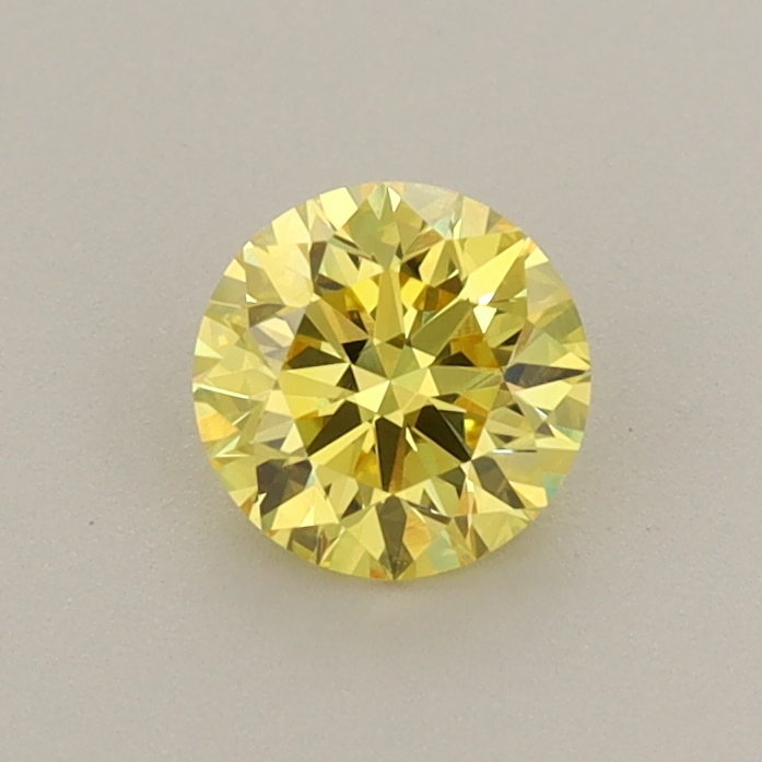 Actual 0.58 carat Vivid Yellow Round lab-grown diamond
