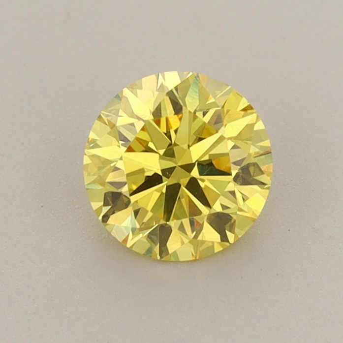 Actual 0.67 carat Vivid Yellow Round lab-grown diamond