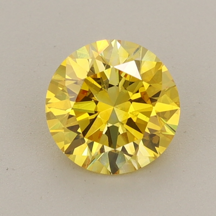 Actual 0.81 carat Intense Yellow Round lab-grown diamond