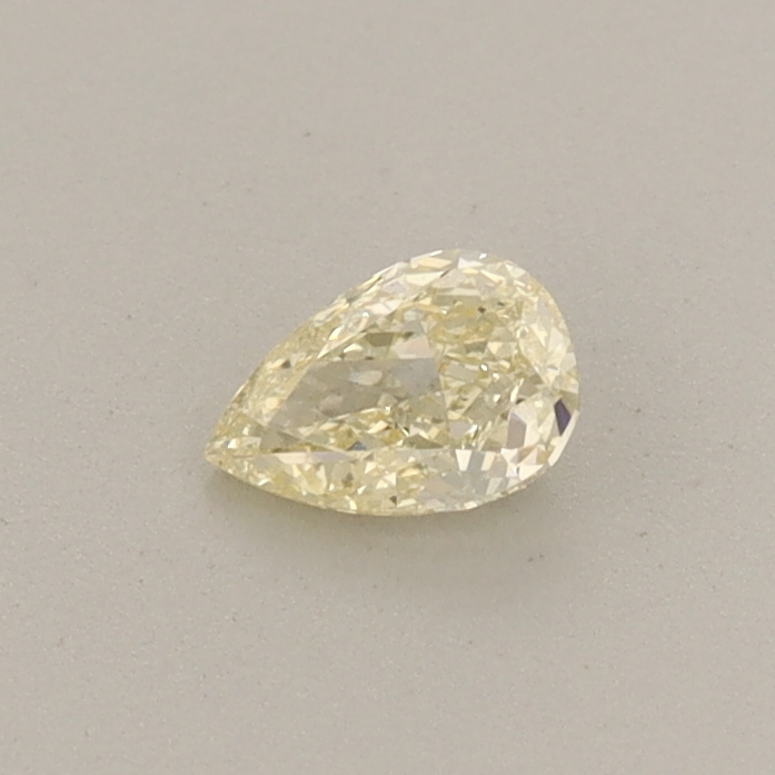 Actual 0.24 carat Fancy Yellow Pear lab-grown diamond