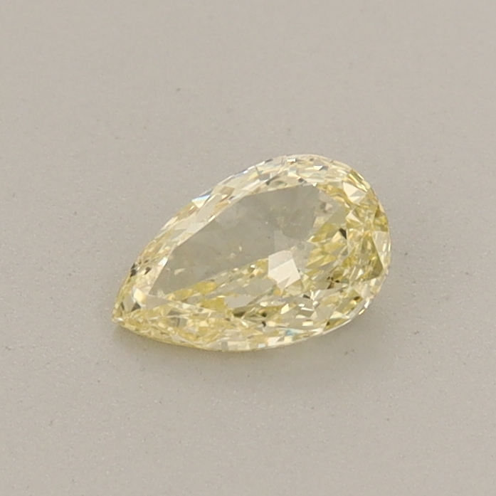 Actual 0.3 carat Fancy Light Yellow Pear lab-grown diamond