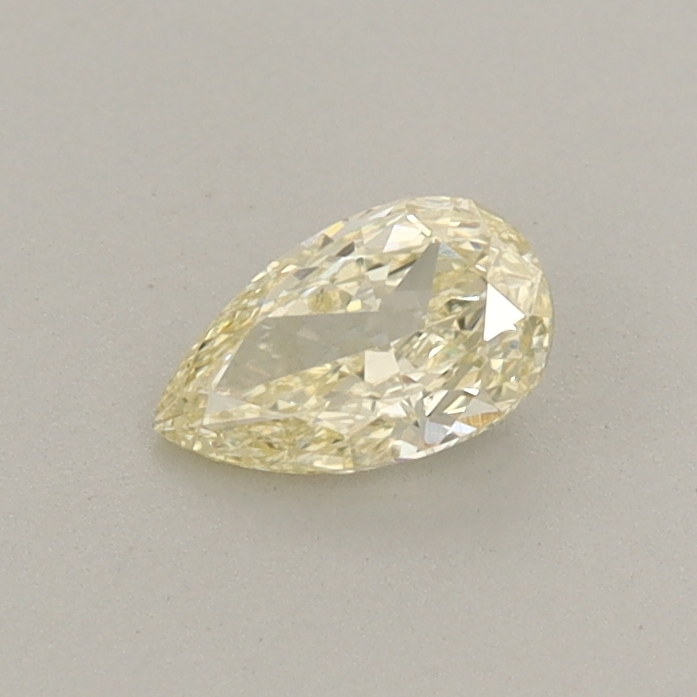 Actual 0.31 carat Light Yellow Pear lab-grown diamond