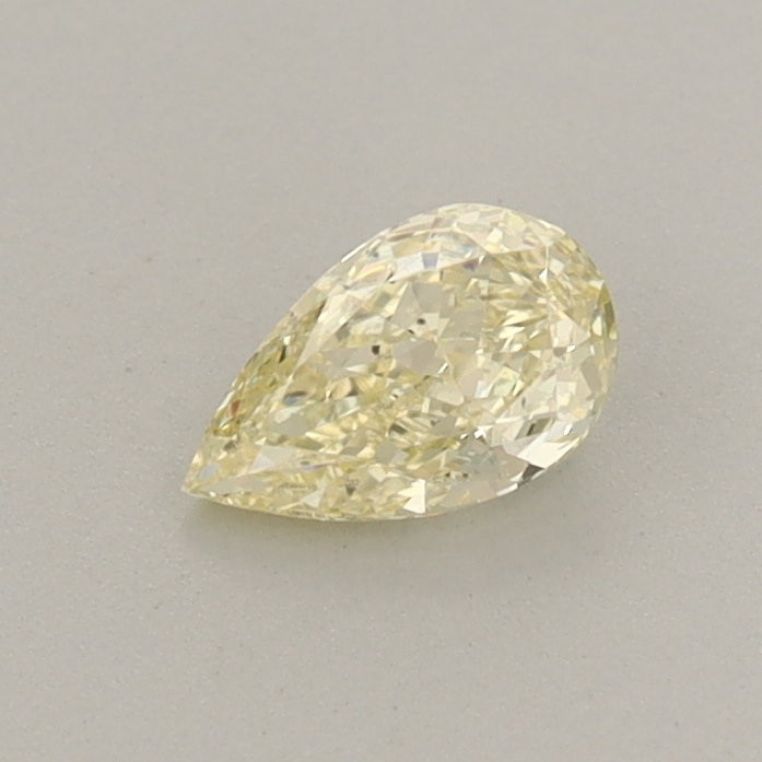 Actual 0.34 carat Fancy Light Yellow Pear lab-grown diamond